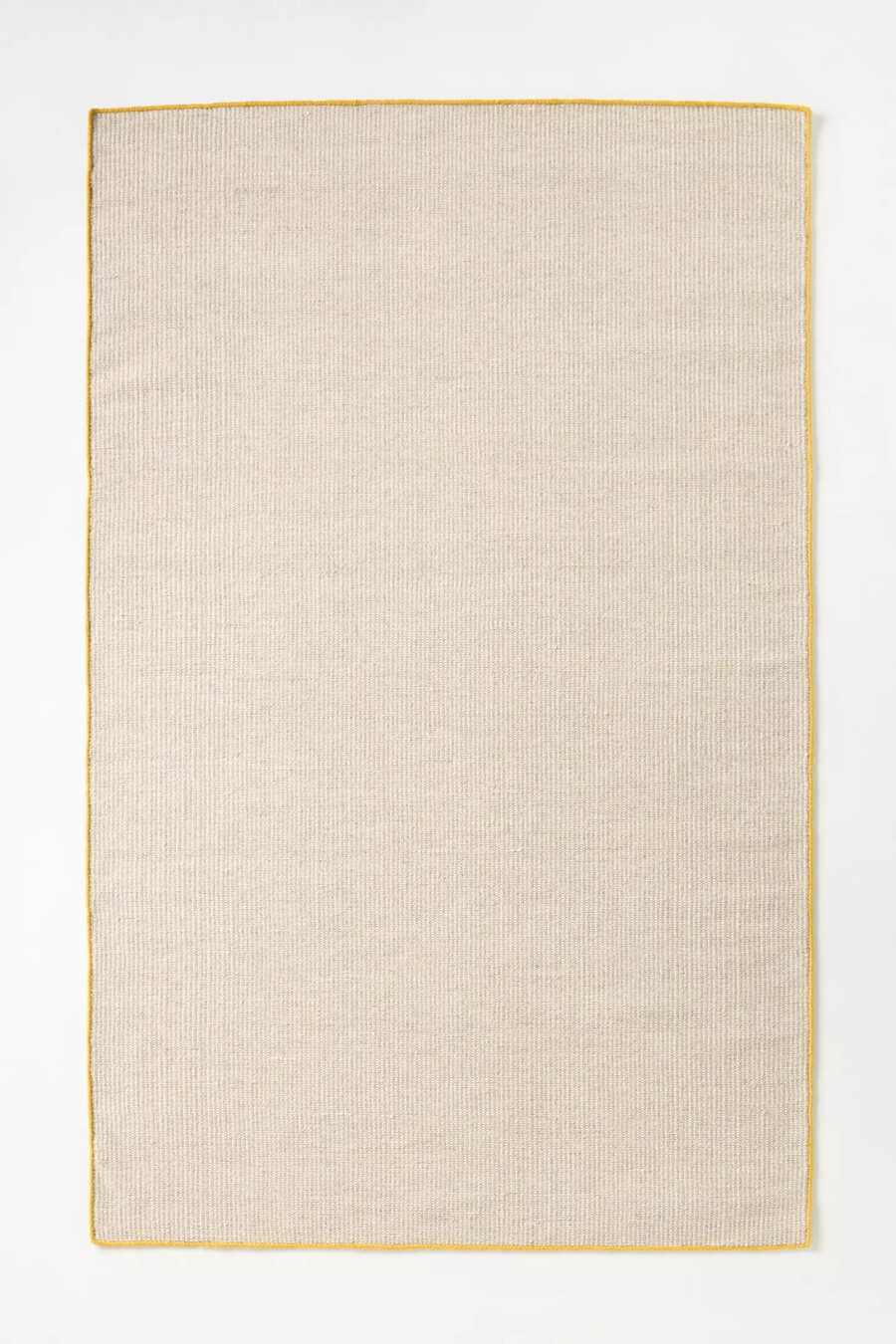 flachgewebter wollteppich mit kontrastierender einfassung